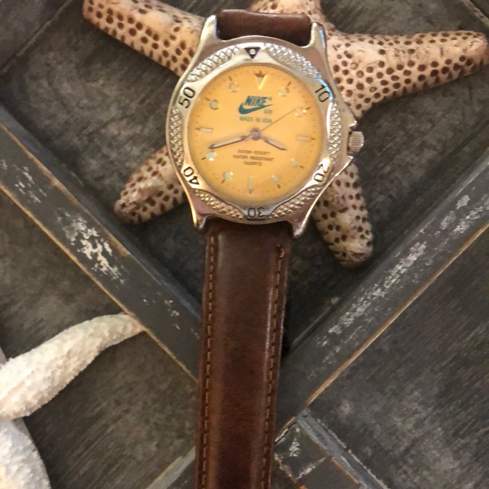 Men’s or Ladies “NIKE” Watch